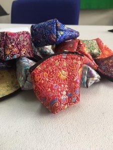 Quilted, zippered stone bags
